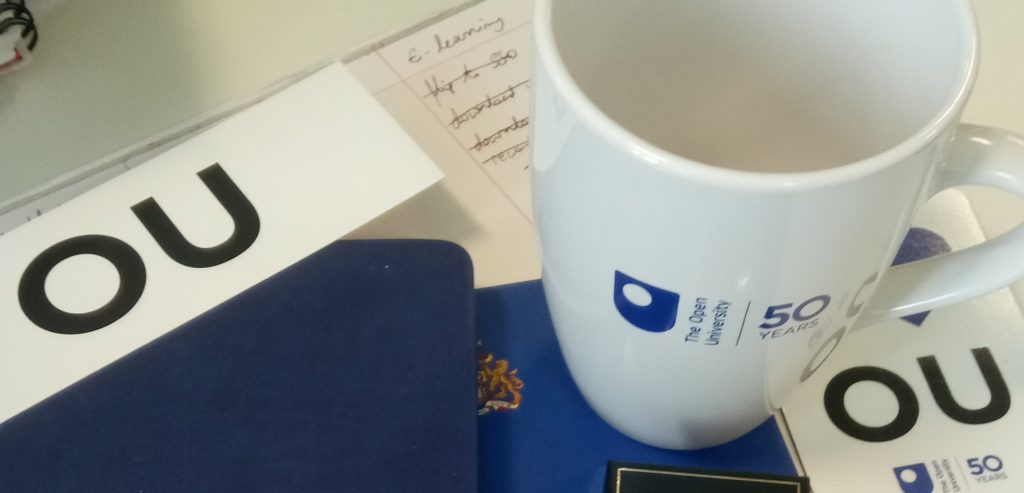 Mug, coaster and bookmark with 'OU/The Open University' branding