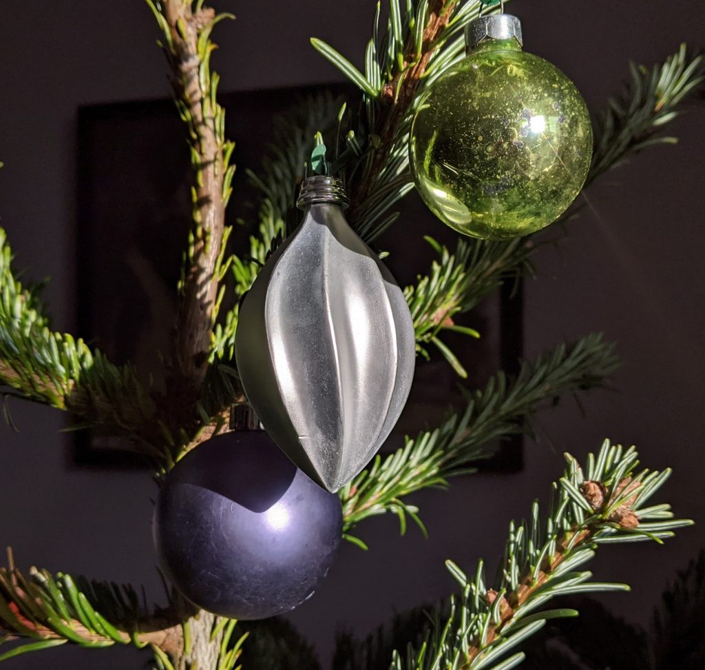 Christmas tree baubles in mauve, silver and green